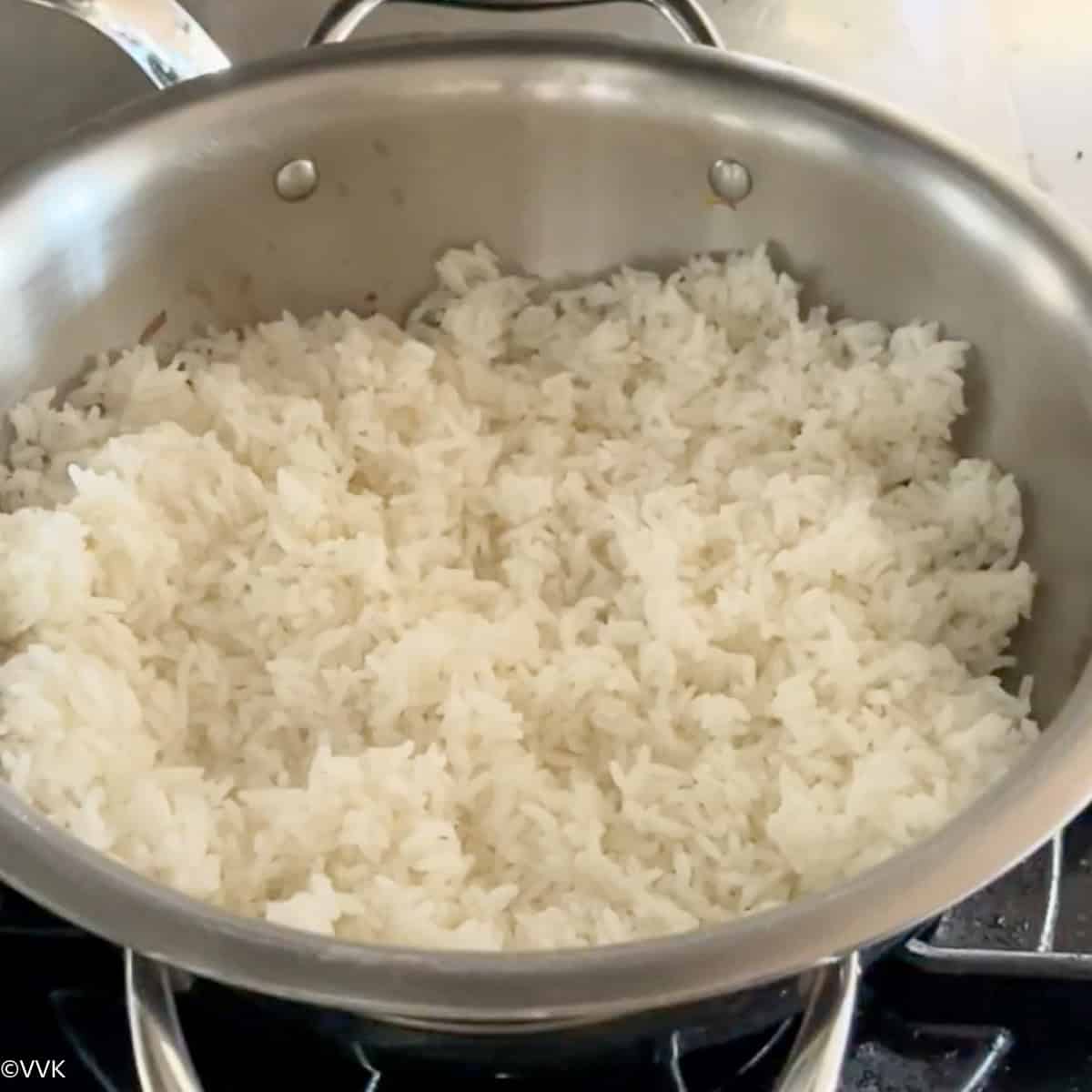 adding rice and oil for raw mango rice