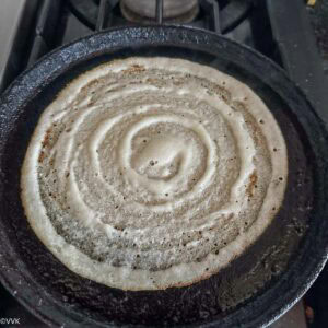 Spreading and cooking the dosa