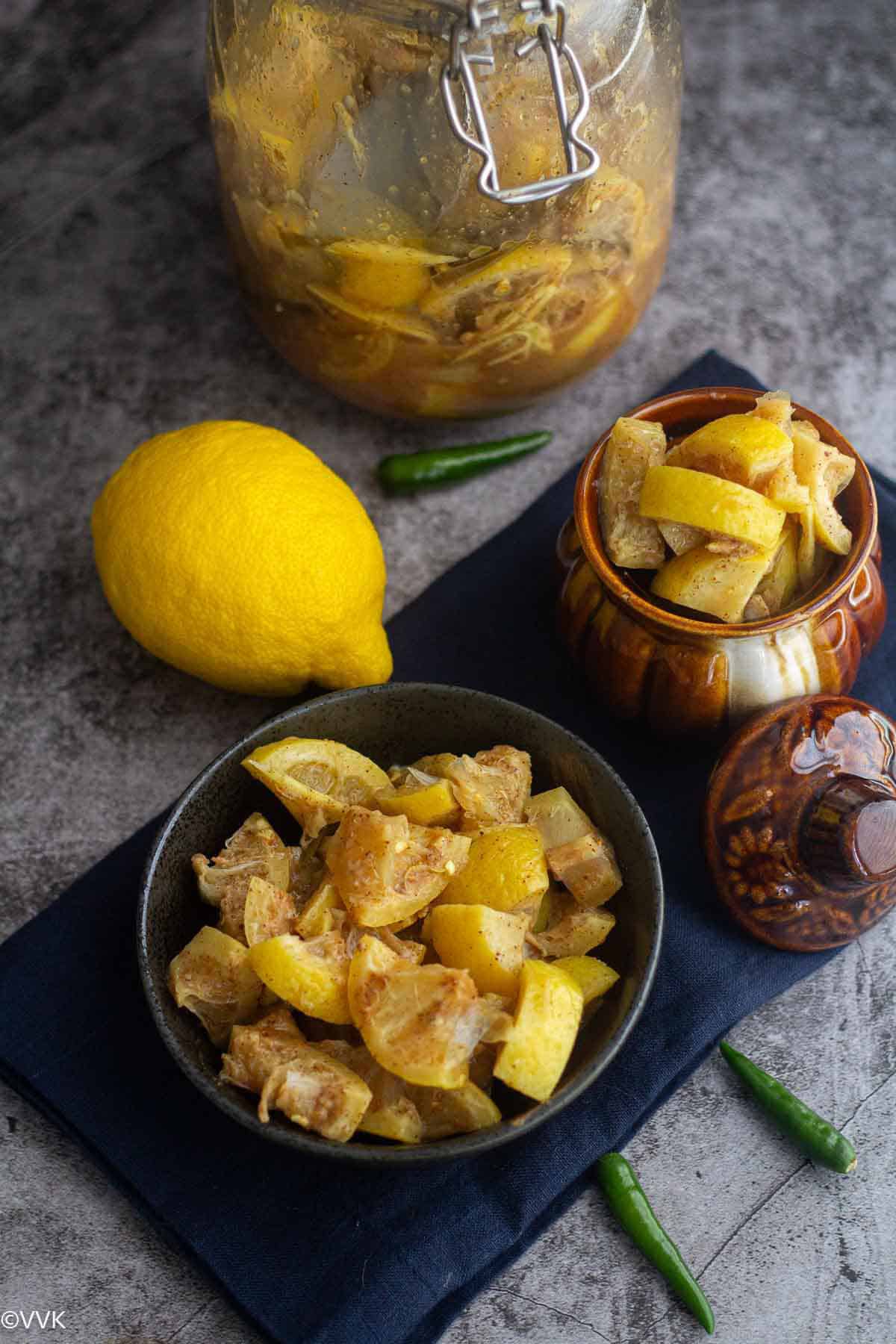 overhead shot of lemon ginger pickle served in bowl and jar