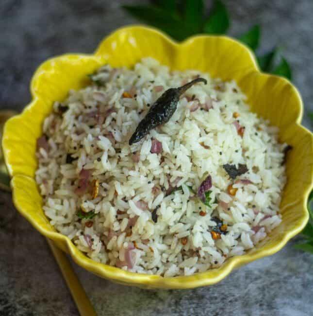 square image of thalicha sadam served in a yellow bowl