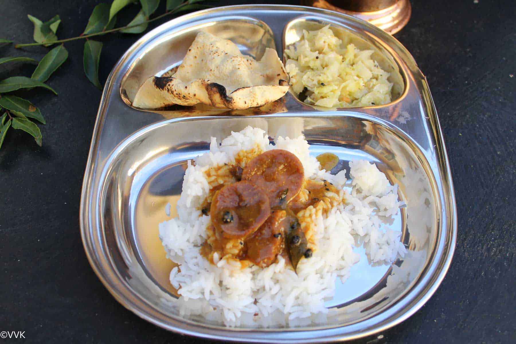 simple thali with rice, vatha kuzhambu, cabbage curry and appalam