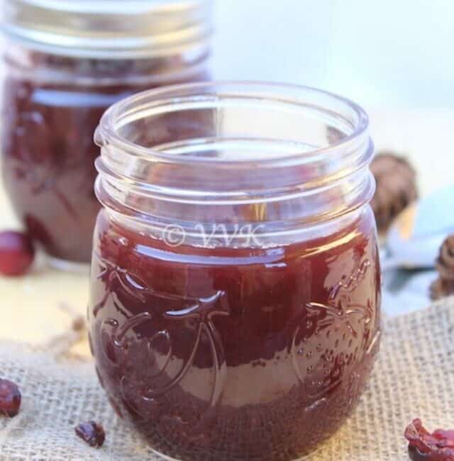 Closeup on the delicious Slow Cooker Cranberry Sauce in a jar