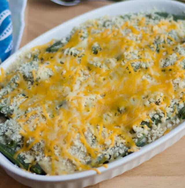 Green Bean Casserole served on a table with a spoon next to it