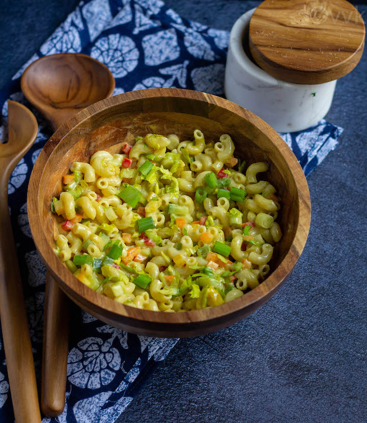 macaroni salad in a wooden bowl after mixing