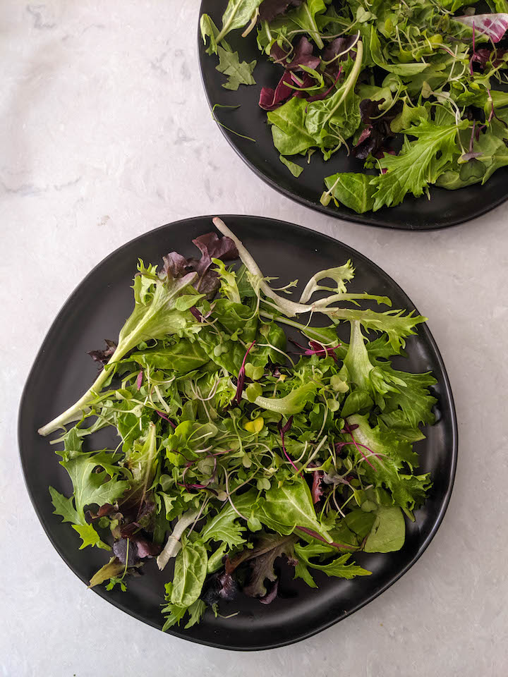 salad - first layer with mixed greens and microgreens