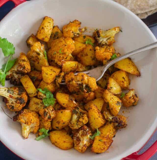 overhead close up of shot of aloo gobi in stoneware