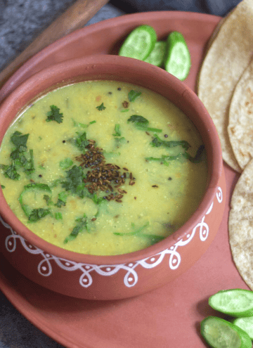 square image of pasi paruppu masiyal served with roti