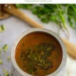 raw mango rasam with text overlay for pinterest