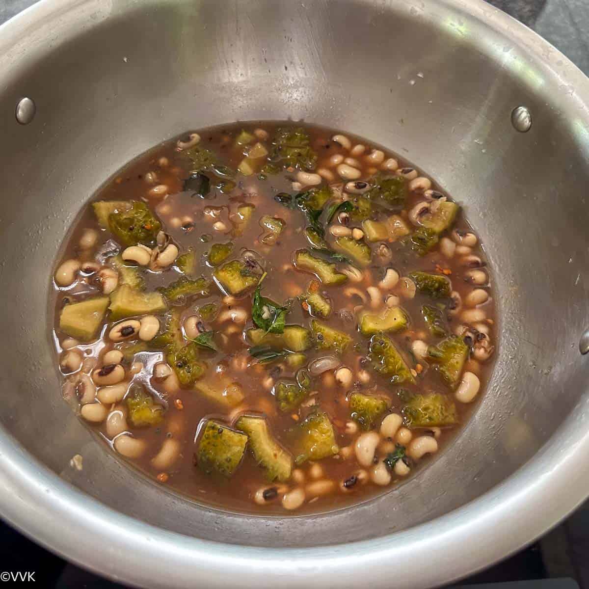 simmering the bitter gourd mix