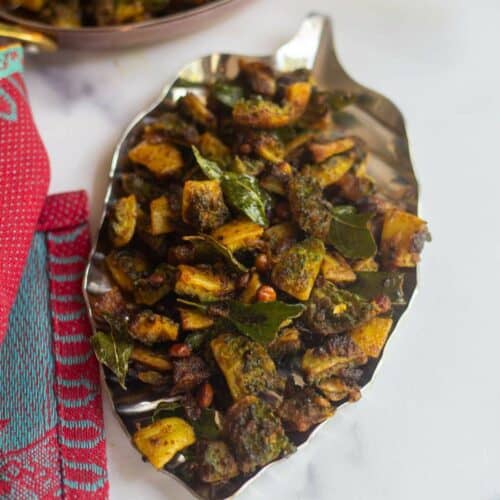 Karela stir fry served in a leaf plate