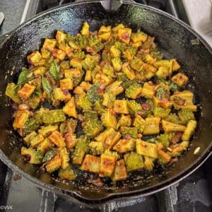 cooking the pavakkai poriyal