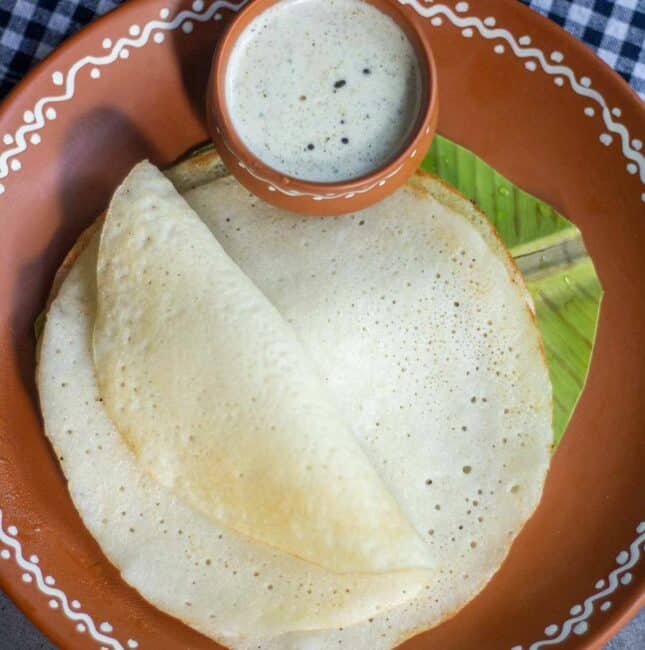 square image of watermelon rind dosa placed on banana leaf