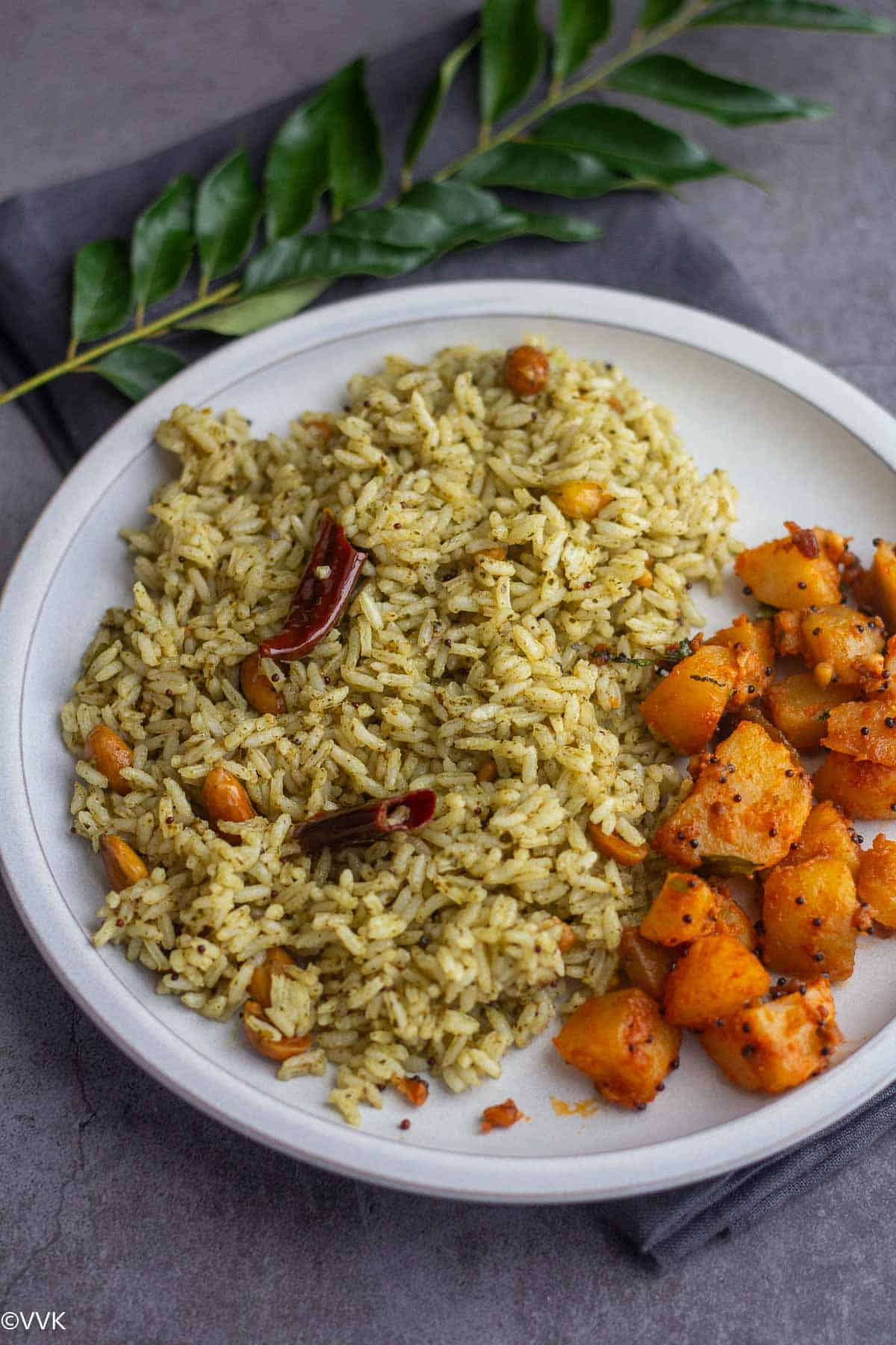 curry leaves pulihora served with potato