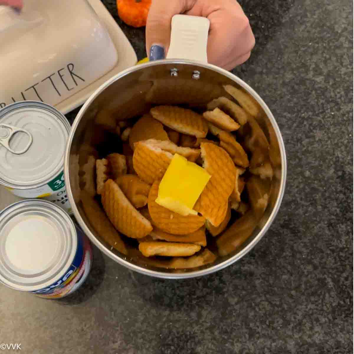 biscuits and butter in a mixer jar