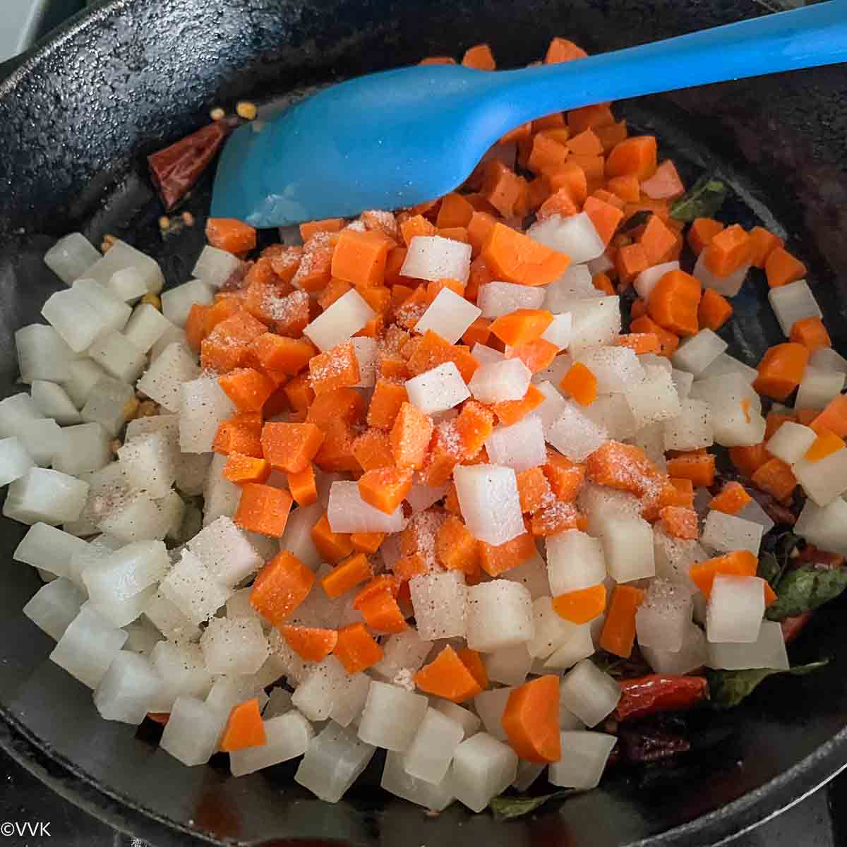 adding veggies and salt