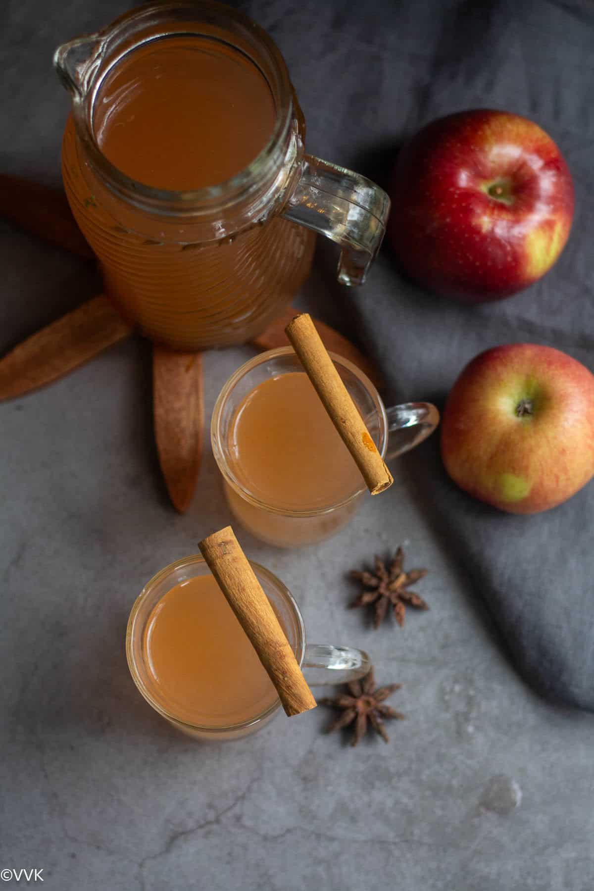 overhead shot of apple cider served in two glasses