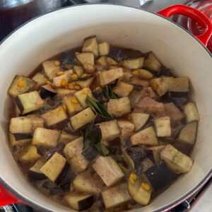 adding tamarind water, curry leaves and salt