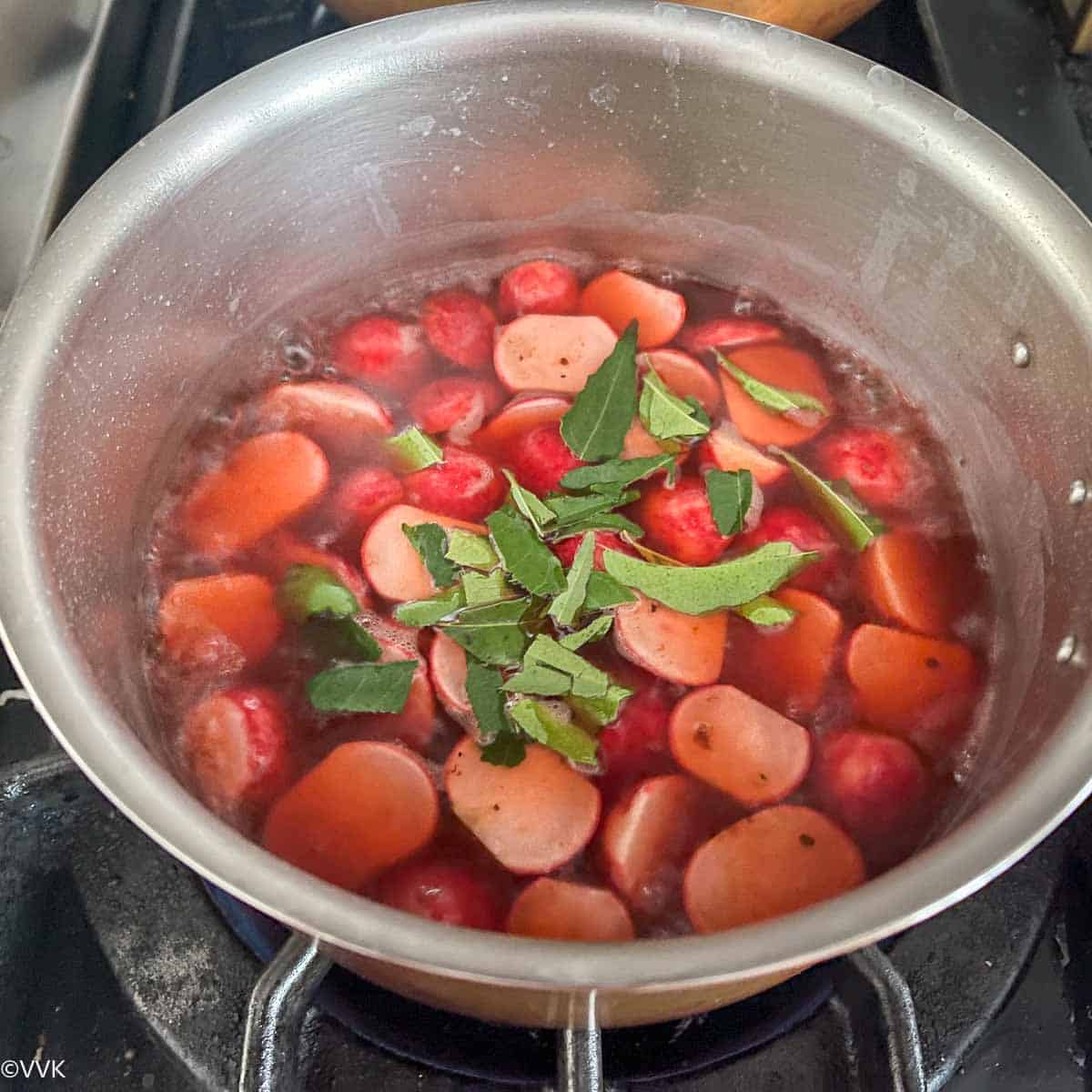 adding curry leaves