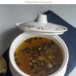 neem flower rasam with text overlay for pinterest