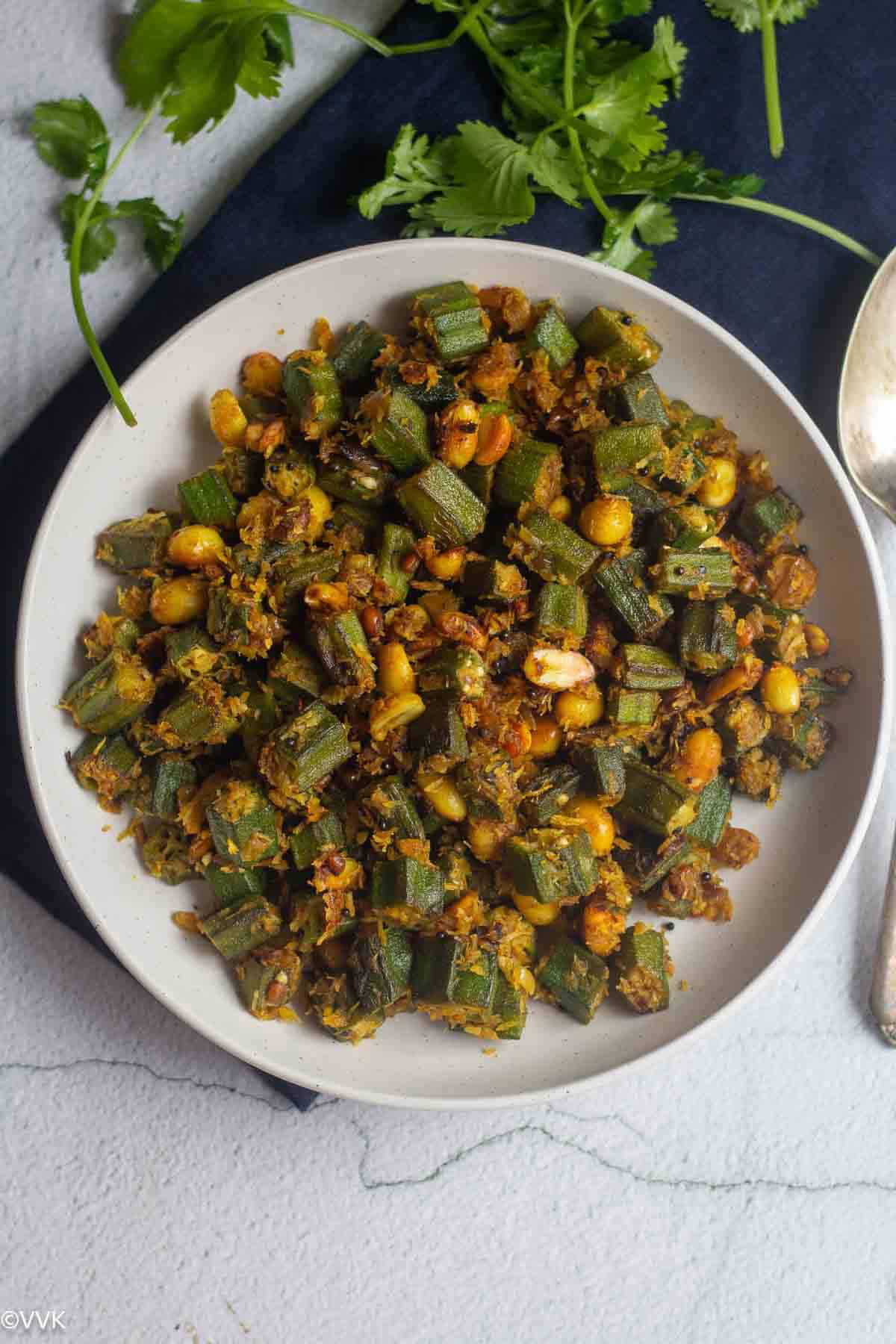 easy venddakai curry for rice in a white plate