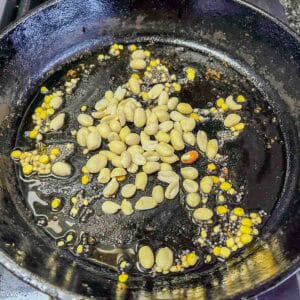 tempering the okra curry