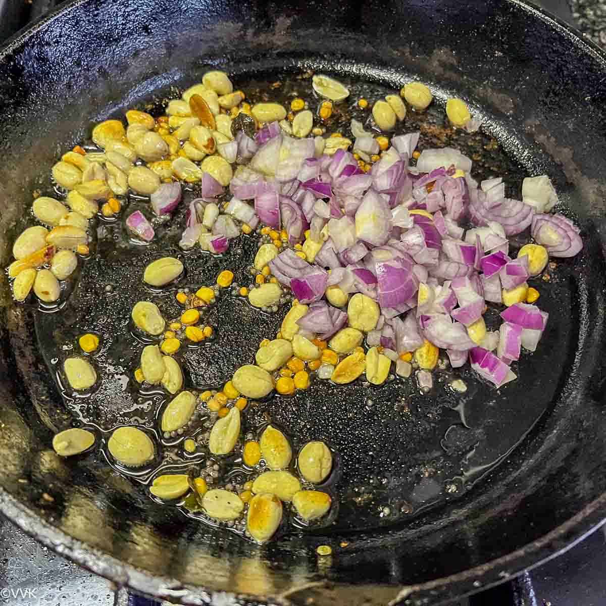 adding shallots for okra curry