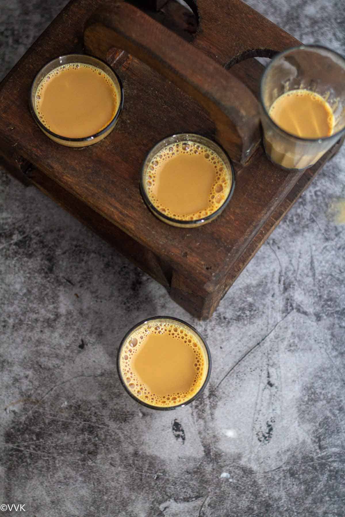 overhead shot of adrak haldi chai in cutting chai style